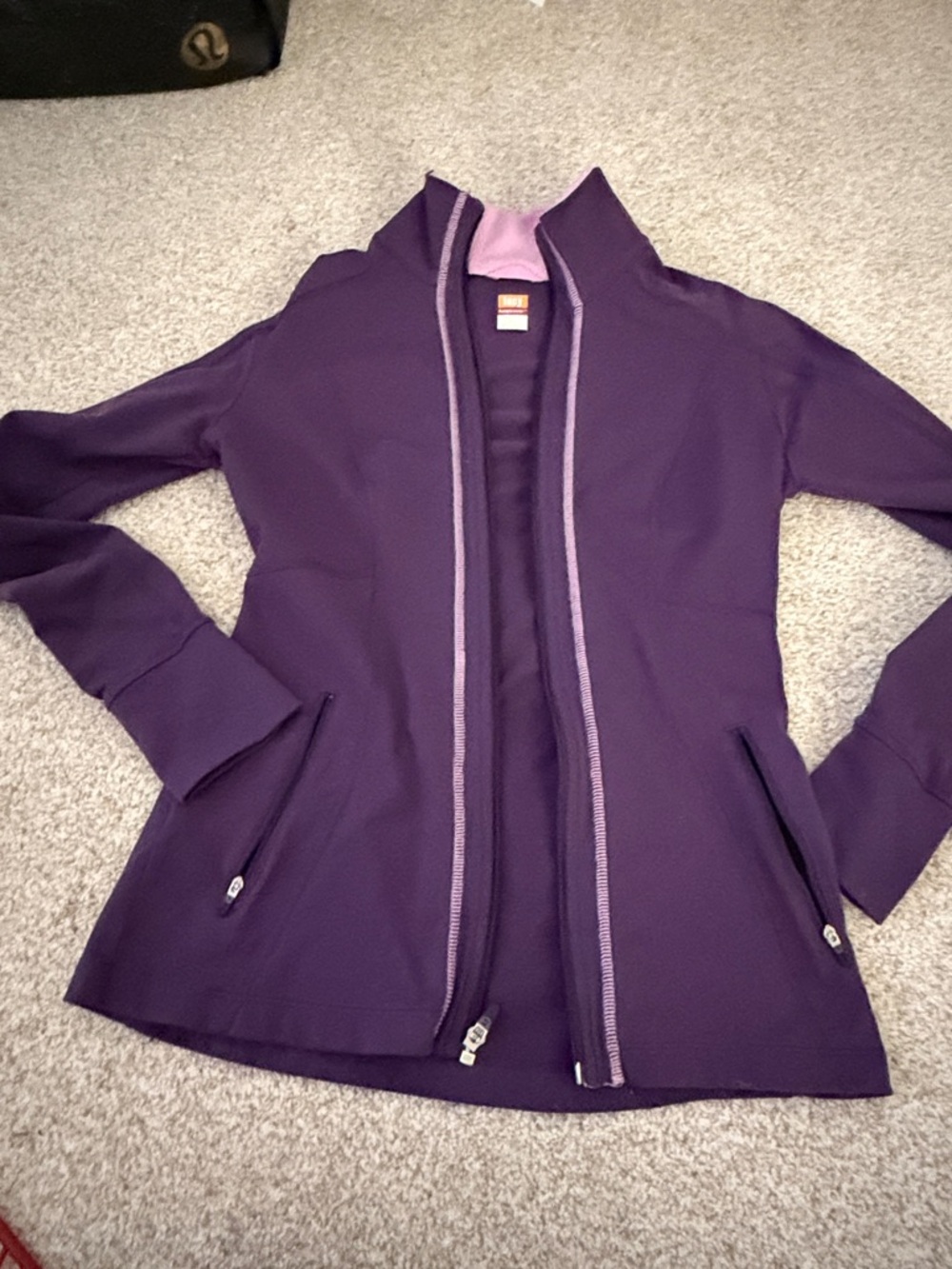 LUCY Women's Purple Zip-Front Jacket. This is similar to a define jacket.